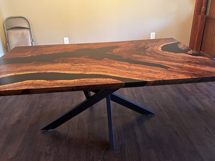 Clara walnut dining table with black resin — view 1