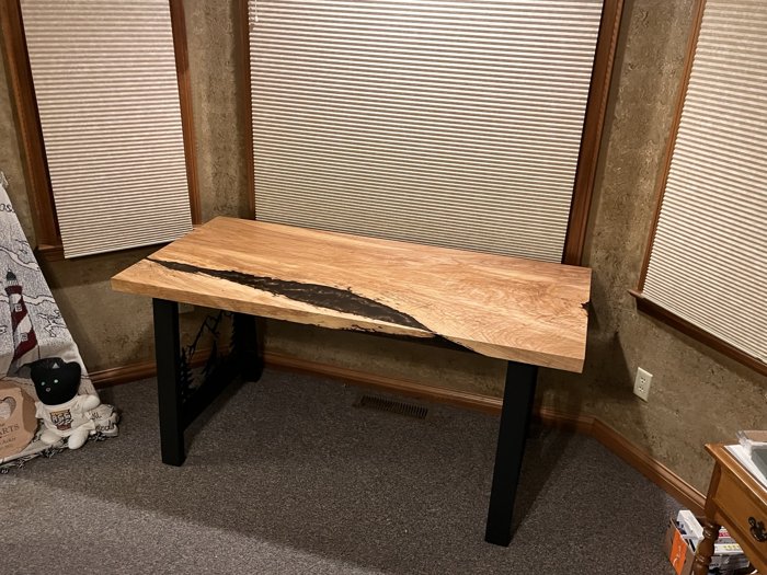 Ash desk set beside the windows